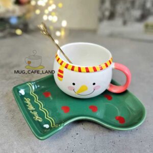 ماگ کریسمسی طرح جوراب آدم برفی رنگ سبز